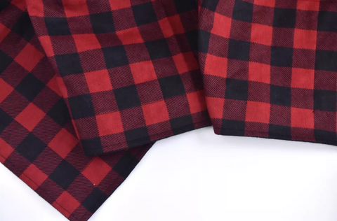 red plaid weighted blanket fabric showing thread work