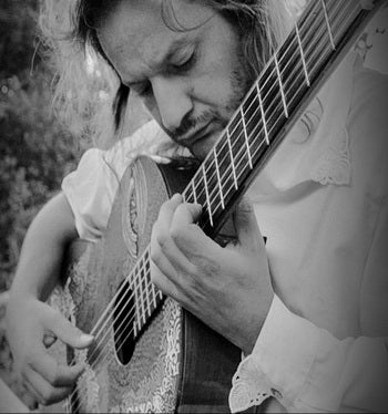 Angelos Tsoutsis with guitar.