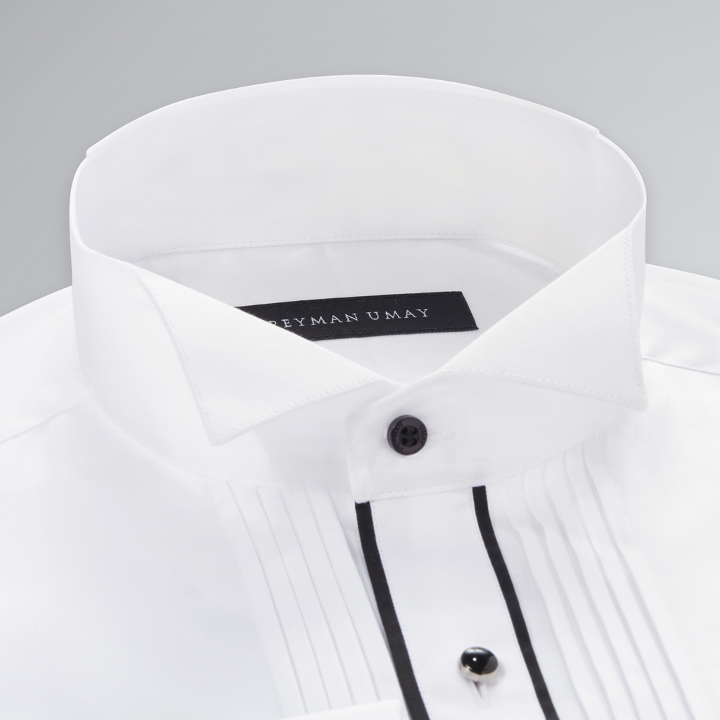 white button up shirt with black buttons