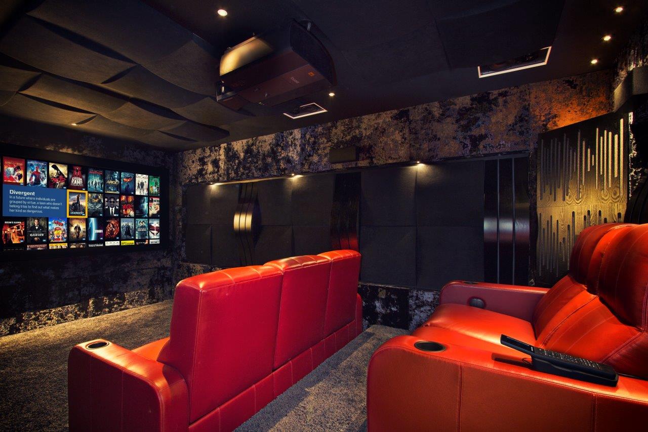 Cinema room with red chairs