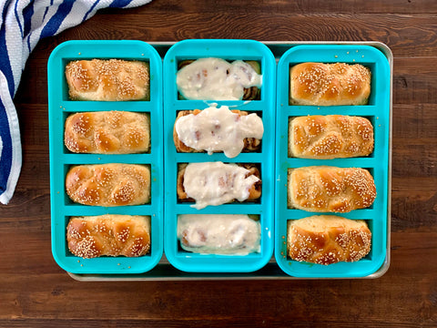 Picture of challah and cinnamon rolls in souper cubes trays