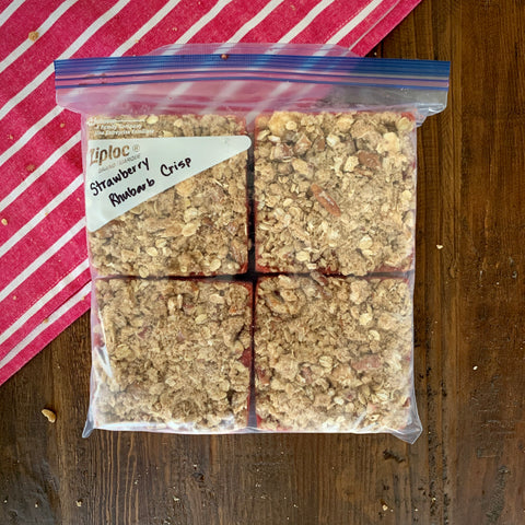 4 2-cup cubes of frozen strawberry rhubarb crisp in a gallon-size bag.