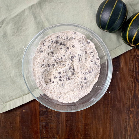 dry ingredients mixed together in a bowl for zucchini bread recipe