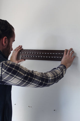 Hanging Dapper Woodworks tie rack