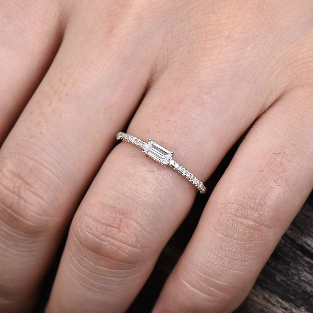 dainty emerald cut diamond ring