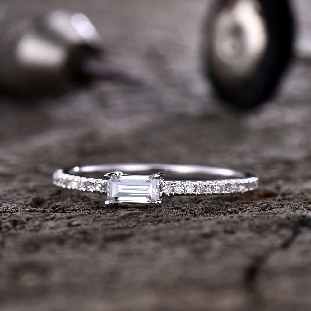 dainty emerald cut diamond ring