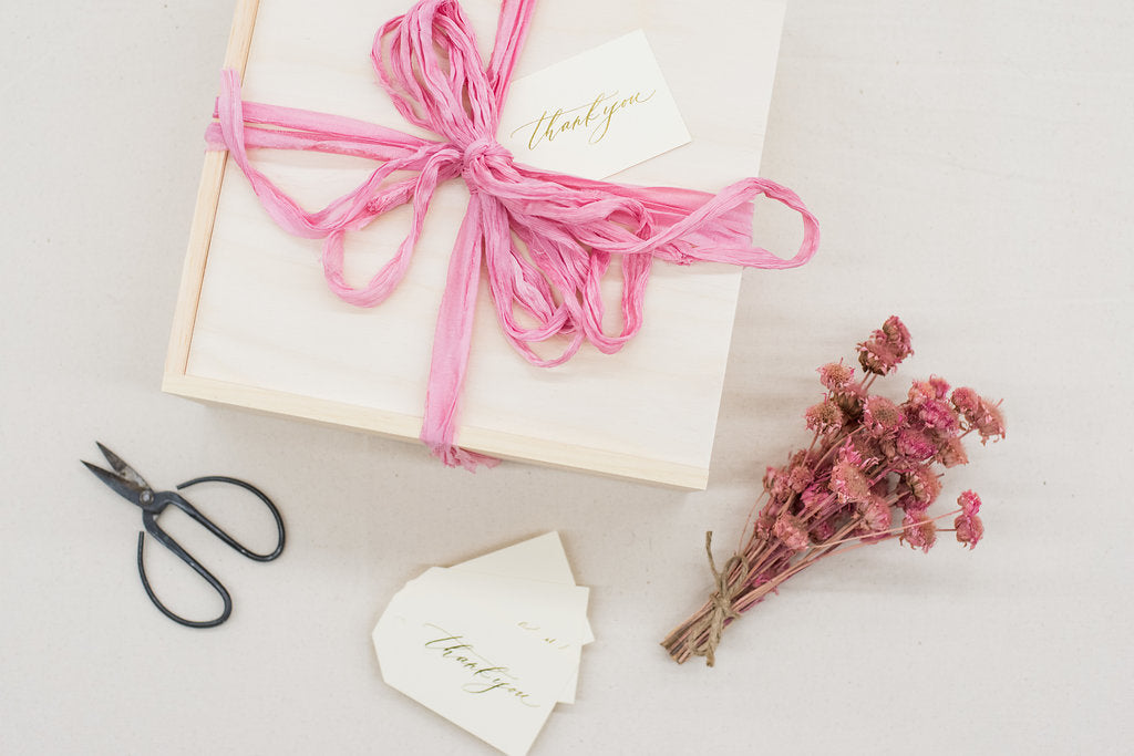 Botanical inspired custom curated gift boxes for luxury wedding floral designer