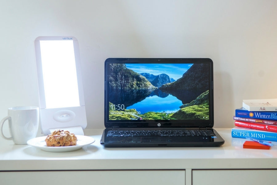 HappyLight over a snack at a desk