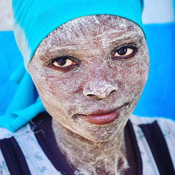 African colour | Woman with Muciro Face Mask, Ibo Island Mozambique