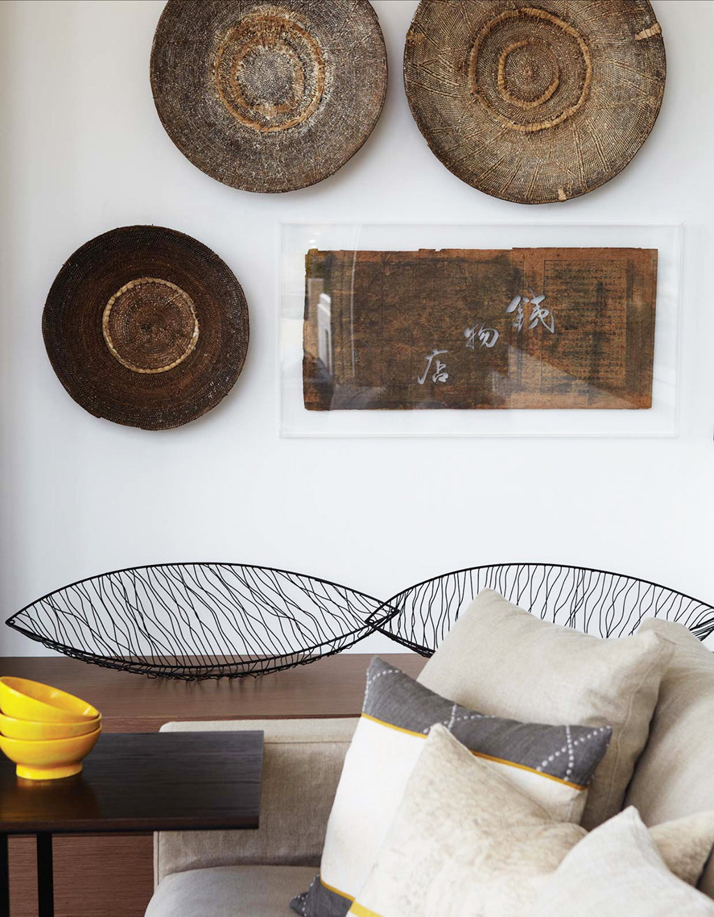 Safari Journal / Blog by Safari Fusion | African baskets / makenge | Living room basket and textile wall display at a Northbridge home by Hare + Klein