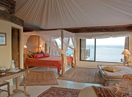 Four-poster beds | Coastal Arabian style at Alfajiri Villas, Kenya