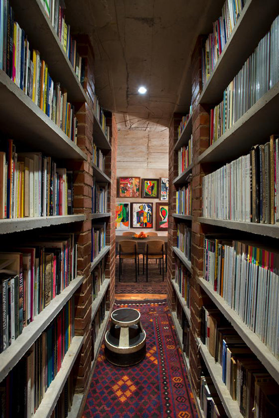  Library style | Brick and concrete modern industrial book shelves in a Pierneef [Pretoria] residence, South Africa
