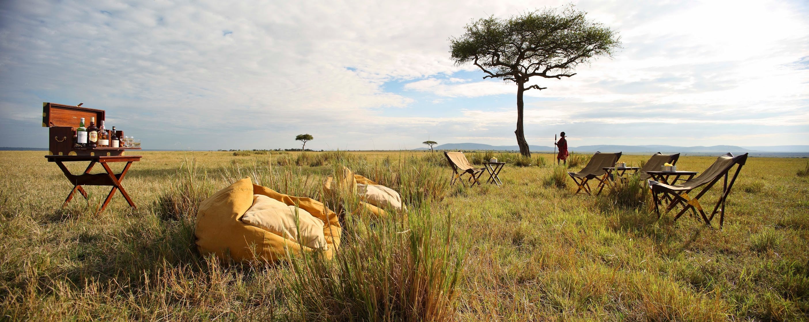 Safari Journal / Blog by Safari Fusion | Tripolina chair | Sundowners on the plains of the Masai Mara, Elephant Peper Camp