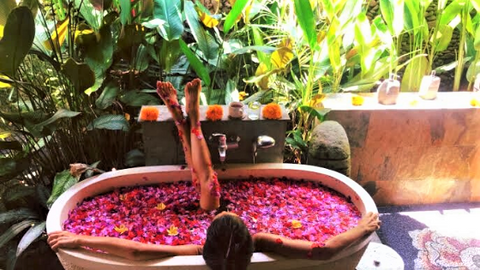 Ayurvedic massage followed by rose petal bath is a must-try wellness treatment in Karsa Spa, Ubud.