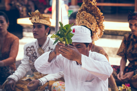 Hindu holding offerings during the traditional Nyepi celebration in Bali. Ogoh ogoh is a tradition on Nyepi eve. 