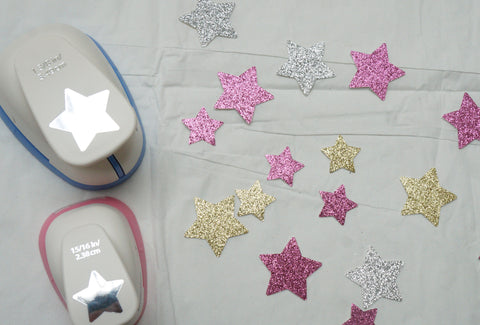 Popper Box Co. making star confetti with cutter