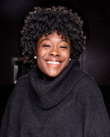 A Canvas Girl with curly/kinky hair in the 4A-4C hair type