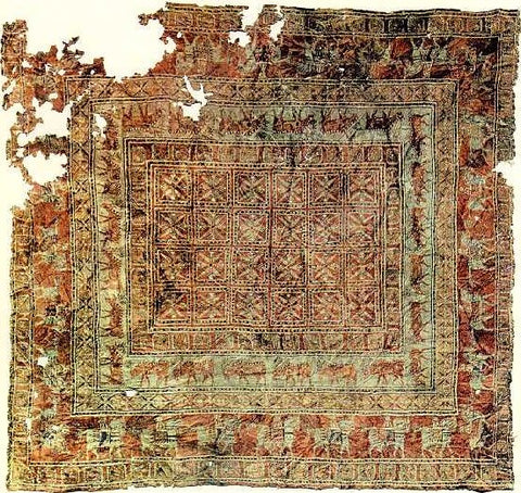 One of the first hand tufted rugs made in Persia.