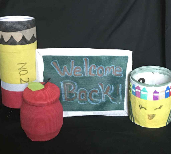 Back to school vet wrap project featuring welcome sign, apple, apple, pencil and crayon box