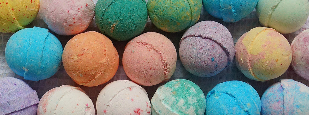 Closeup of bath bombs of several colors
