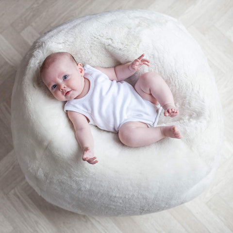 baby nestled in our oyster baby beanbag 