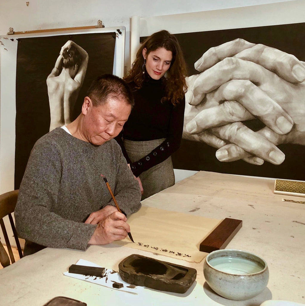 Qu Lei Lei demonstrates calligraphy with Dagmar Carnevale Lavezzoli