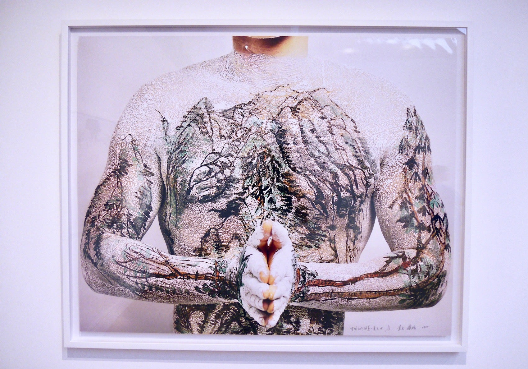 Highlight photograph in Huang Yan's Tattoo Utopia show in Hong Kong at Leo Gallery