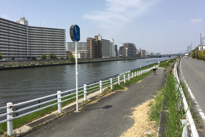 The ramp down to the cycling path along the Kanzaki river.