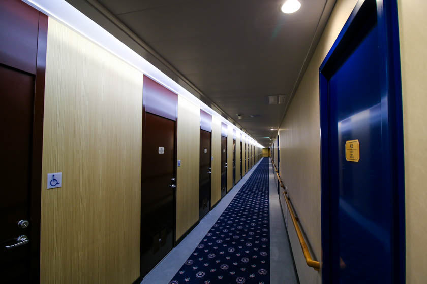 Doors to the rooms on the orange ferry going between Osaka and Ehime.