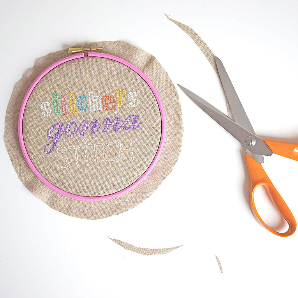 Place your stitching in a hoop and trim excess fabric