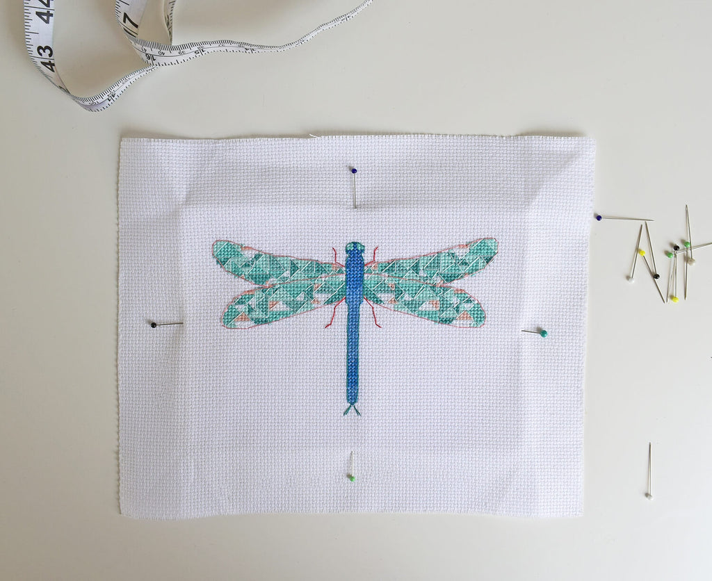Framing your embroidery - pin the centre of the edges