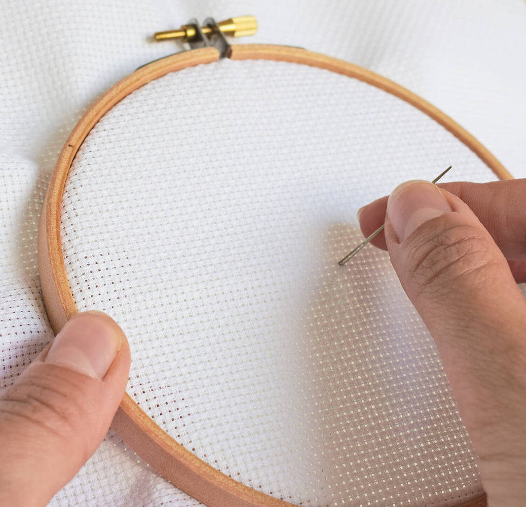 Begin stitching - how to cross stitch