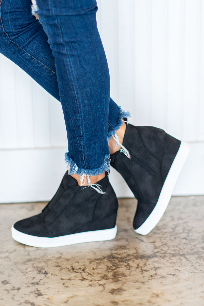 black wedge sneakers with black sole