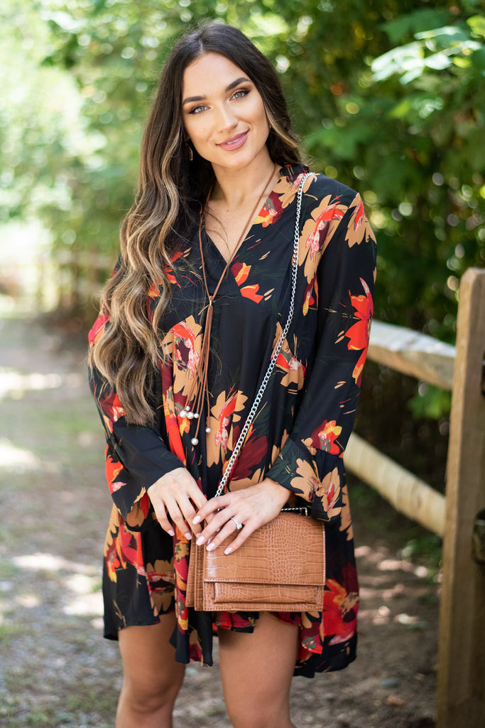 black dress with bright flowers