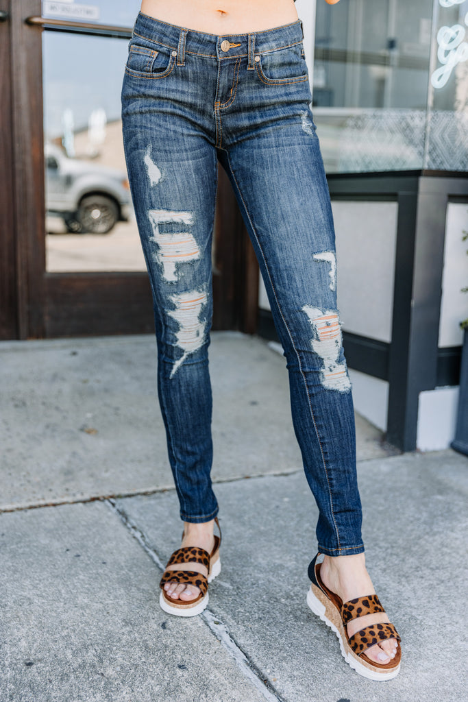 dark washed ripped jeans