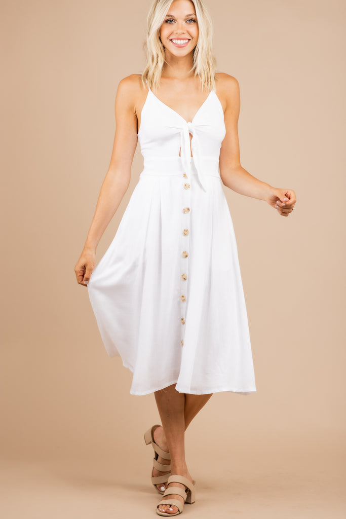 white dress with buttons down the front
