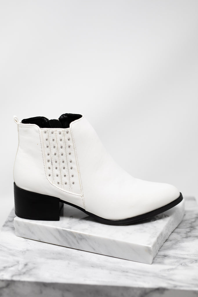 black booties with white sole