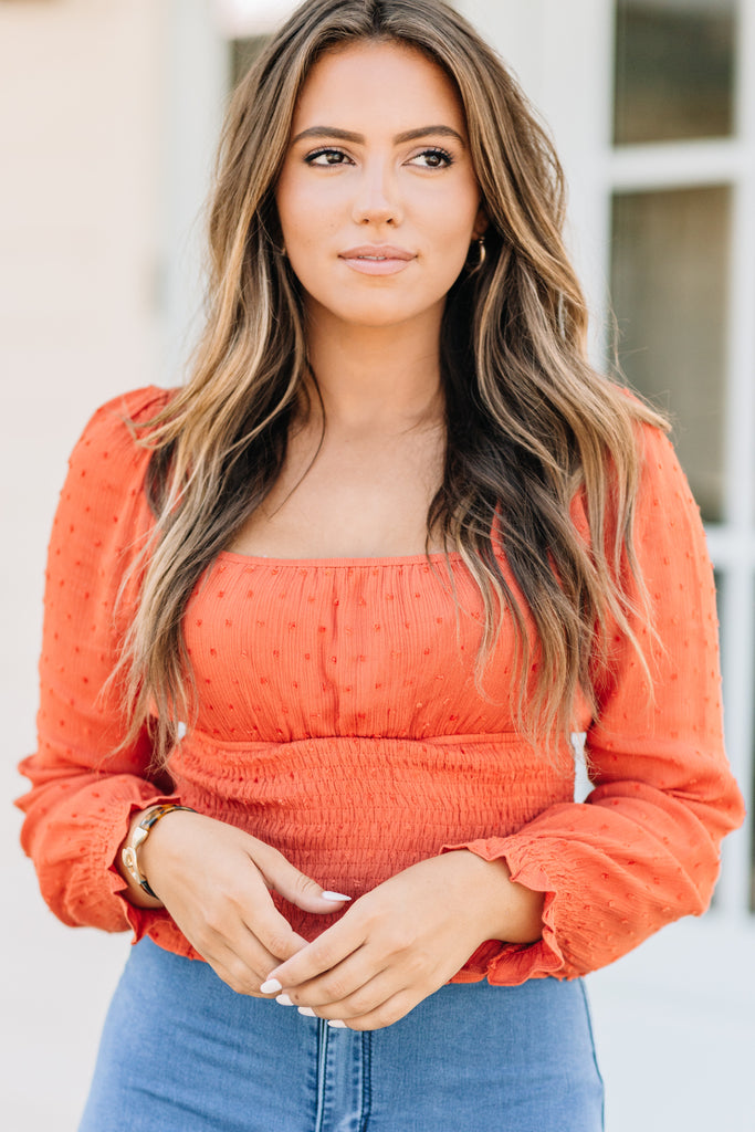 orange smocked top