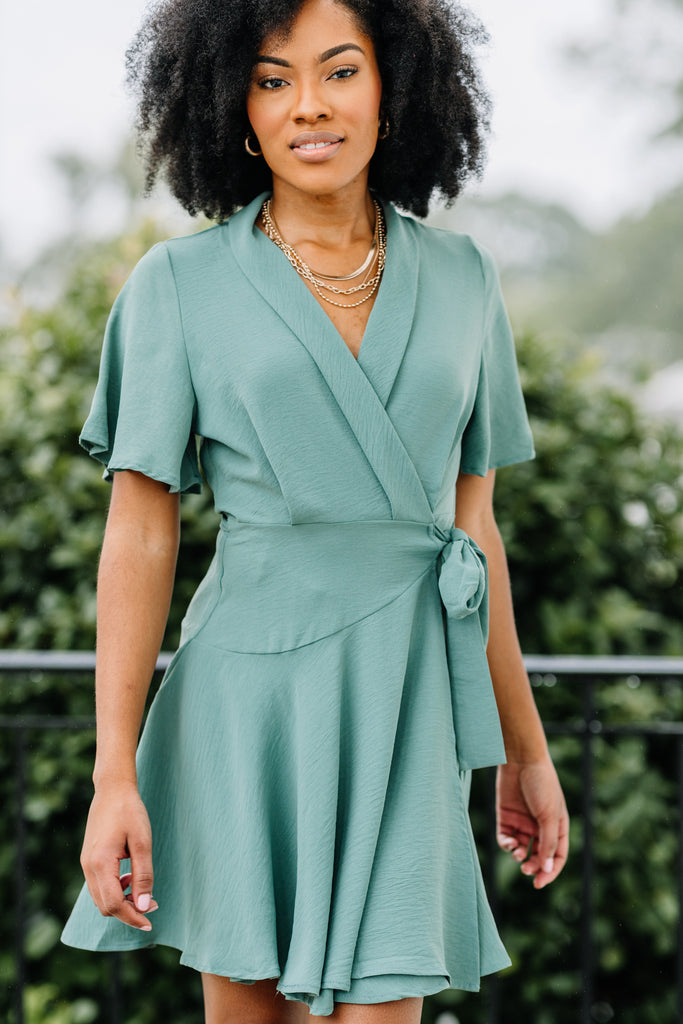 green and black wrap dress