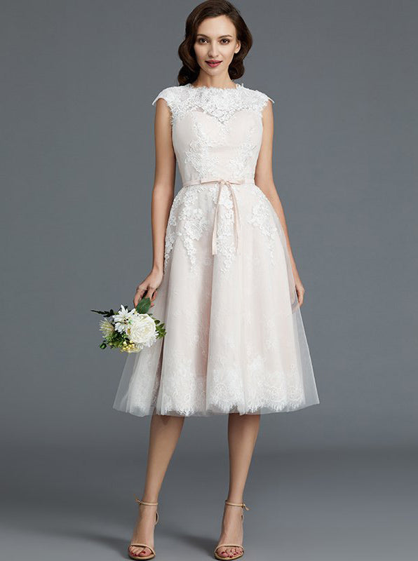 white knee length wedding dress