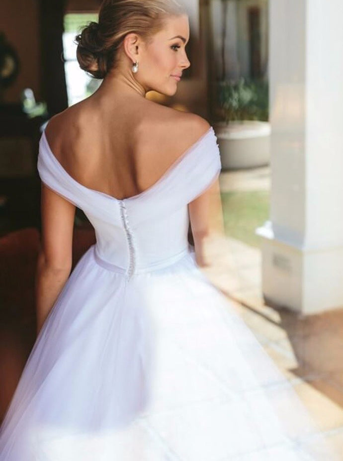 off shoulder white wedding gown
