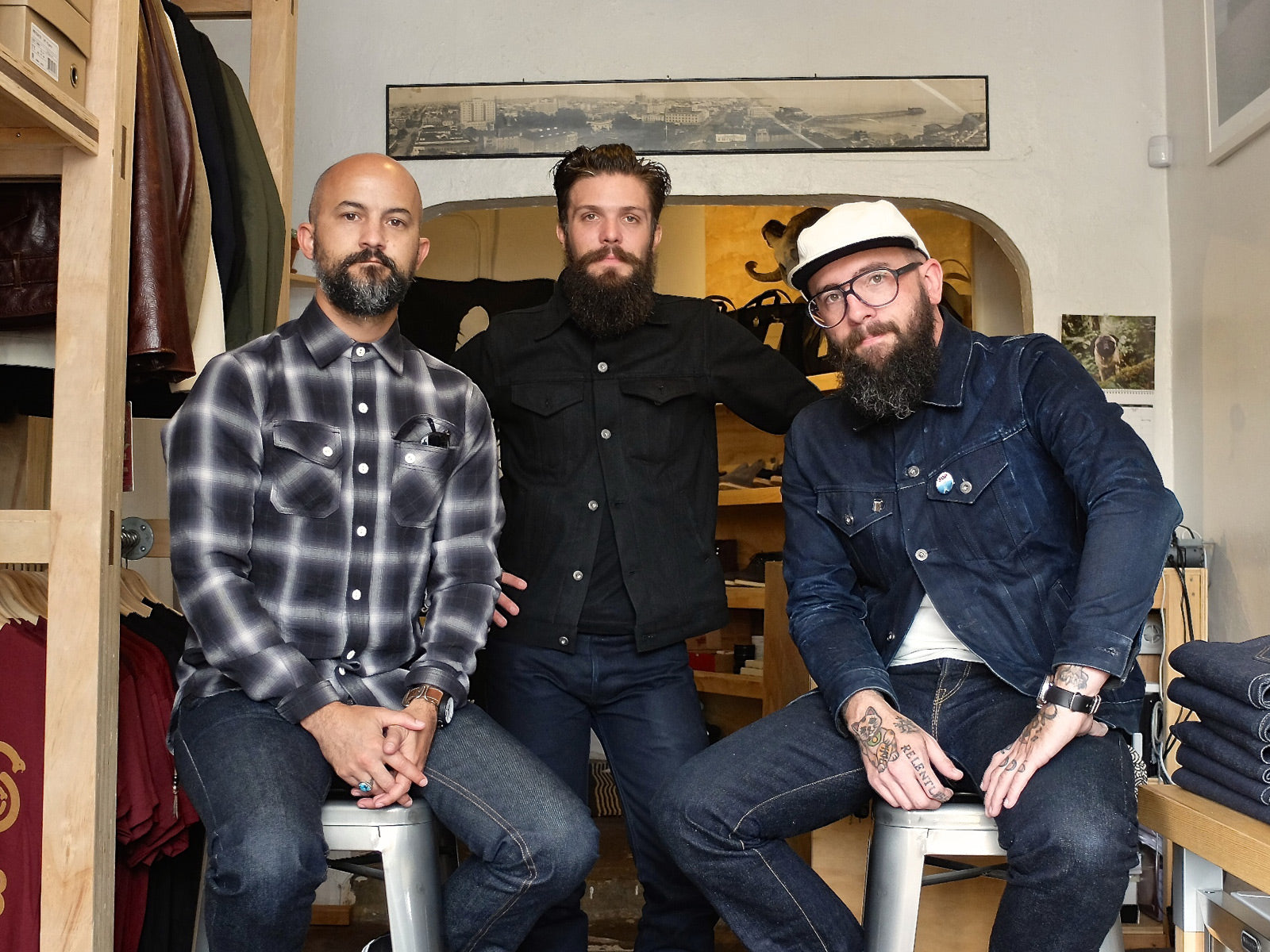 Josh, Matty, and Ben of SOP posing inside their store.