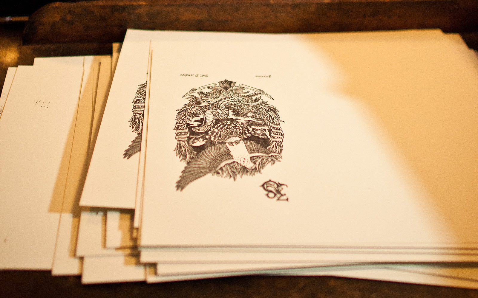 Our collaborative postcards lay on a table.