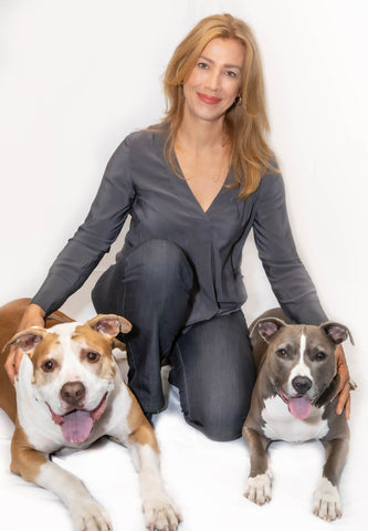 Certified Clinical Pet Nutritionist Johnna Devereaux and her two dogs
