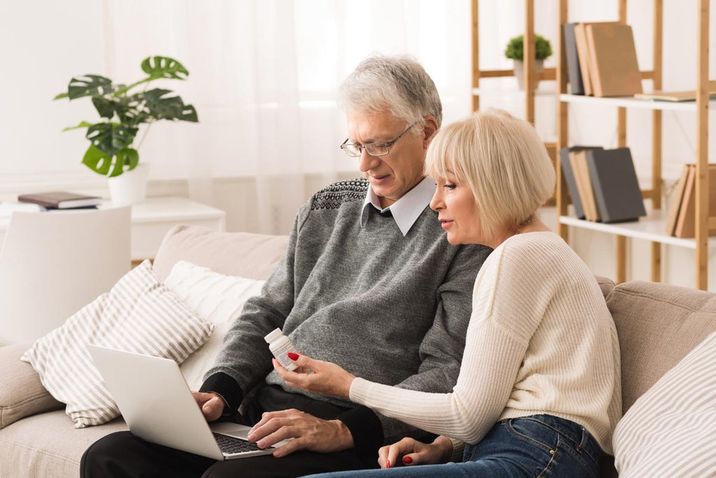 Photo of an older couple shopping for turmeric curcumin online