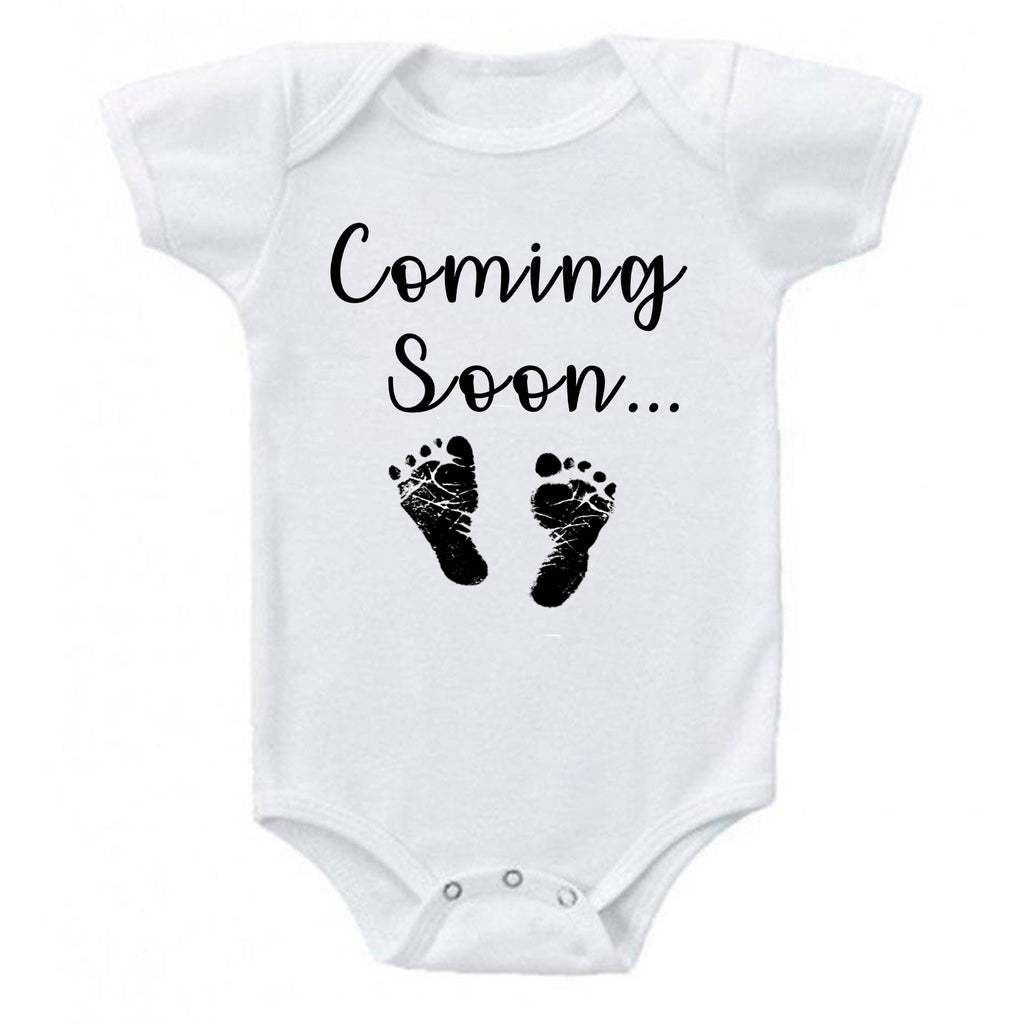ndapprenticeships® Baby Coming Soon Foot Prints Pregnancy Reveal Announcement Baby Romper Bodysuit Media 1 of 13 Pregnancy reveal, baby announcement, baby shower gift, coming soon onesie, coming soon baby onesie, Announcement onesie