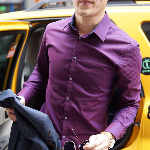 purple dress shirt being worn outside of a yellow cab