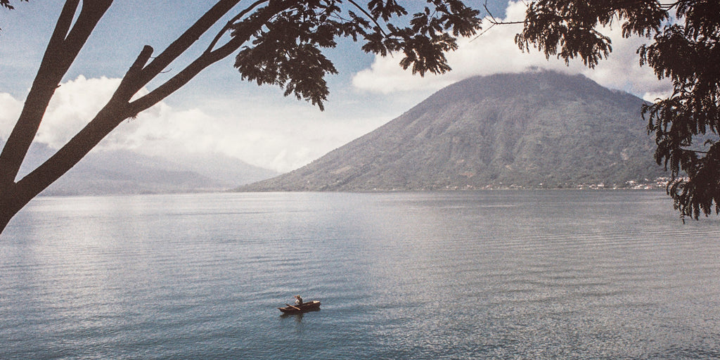 atitlan lake fisherman canoe guatemala gaiardo