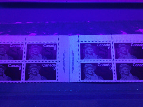 The dull and fluorescent papers on the 1972 Frontenac stamp of Canada as seen from the front