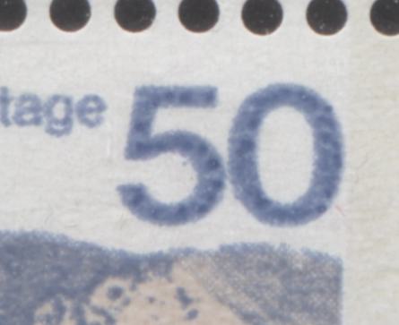 The dot inside the "5" on the 50c Seashore stamp of the 1972-1978 Caricature Issue of Canada